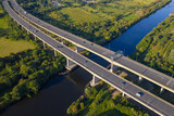Close aerial view of the M6 motorway on Thelwall Viaduct spanning the River Mersey near Warrington, showcasing the twin carriageways,
