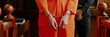 © AnnaStills - Caucasian young adult man standing in courtroom wearing handcuffs with hands in front, accompanied by Black man in uniform standing behind, legal proceedings in progress
