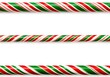 © RAMS - Vibrant Red and Green Striped Candy Canes Perfectly Set Against a Clean White Background