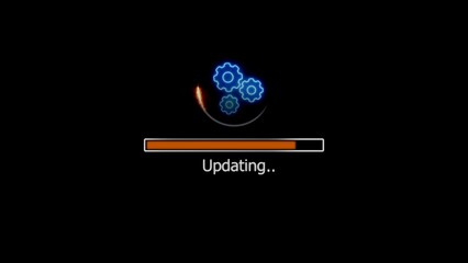 Software update process with progress bar and animated gears in a dark interface