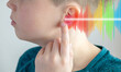 © kittyfly - Closeup caucasian small childs ear, sound wave, Hearing Test, ringing or buzzing sensation, Auditory impairment, tinnitus, Inflammation middle ear, acoustic trauma