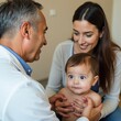 © Joy - Happy baby with doctor and mother during medical checkup in clinic examining health care examination