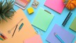 © Berkah - Creative workspace with pastel stationery, clipboards and school supplies