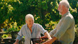 © Monkey Business - Close Up Of Retired Senior Couple Working In Vegetable Garden Or Allotment Picking Beetroot