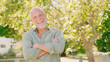 © Monkey Business - Portrait Of Smiling Senior Man Standing Outdoors In Garden Park Or Countryside