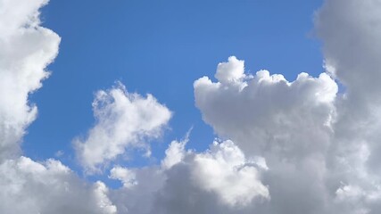 Wall Mural - heaven landsacpe of amazing cumulonimbus growing in the bright blue sky in afternoon