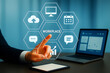 © Faisal - Digital workplace concept with hand touching virtual screen icons