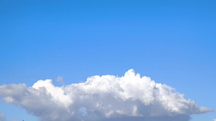 Wall Mural - landscape of a beautiful white cumulonimbus developing in afternoon