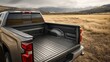 © Generative AI - Open Bed of Silver Pickup Truck in Rural Landscape with Mountain Backdrop