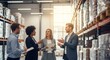 © Nazlykhan - Diverse professionals discuss logistics in modern warehouse setting