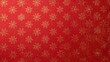 © AkuAku - Full frame image of red seasonal wrapping paper with a repeating design of gold snowflakes