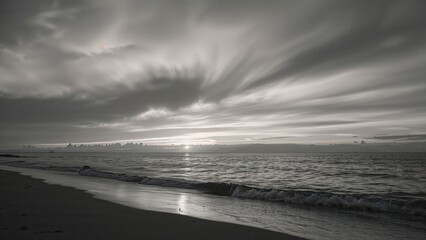Wall Mural - grayscale picture showing a sunset with clouds in a natural setting