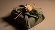 © GL Designs - Eco-Friendly Gift Wrapped in Reusable Fabric with Dried Flower and Twine