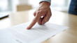 © Pixel Vista - Close up of Business Person Pointing to Legal Document for Reviewing Contractual Agreement Details and Analyzing Important Clauses Prior to Signing
