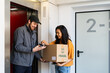 © Alba Vitta Studio/Stocksy - Delivery Man package