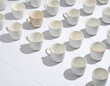© CaRbodY - Ceramic cups placed on wooden floor