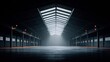 © NovaVision - Dramatic interior view of a large, empty warehouse with an industrial design.