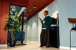 © Sergey Narevskih/Stocksy - Coffee break in shared office kitchen