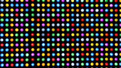 Colorful round lights arranged in a grid pattern.