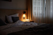 © Ivan Jovanovic/Stocksy - Hotel room in lowlight
