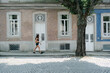 © Lea Jones/Stocksy - young woman in  of the city of Porto in Portugal