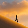 © Ryzhkov - Silhouette of Person Walking on Sand Dune at Sunset Modern Authentic Lifestyle Content for Motivational Marketing and Personal Growth Campaigns