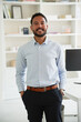 © Elena Kharichkina/Stocksy - Professional man in modern office environment
