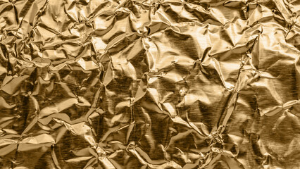 Wall Mural - luxury shiny metallic bronze foil crumpled texture background