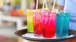 © Chatchanan - Refreshing summer drinks celebration at the beachside vibrant beverage photography showcasing colorful summer vibes in close-up view