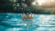 © Yuliia - Golden crown floating on turquoise water surface with splashing droplets and sunlight bokeh creating magical atmosphere. Perfect for fairy tale concepts.