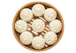 © Vooglo.com - Top view of delicious steamed bao buns arranged in a bamboo steamer basket, isolated on transparent background