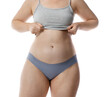 © New Africa - Liposuction. Woman in underwear on white background, closeup