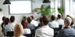 © annaspoka - business training seminar education lecture staff meeting or workshop, abstract people group siting in auditorium learning listening to presentation