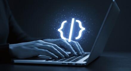 Web development and programming concept. Coder using laptop to write software code and develop applications.