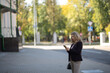© shymar27 - Portrait of a beautiful young blonde girl in a city park.