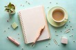 © Shopibizz - Flat lay of notebook, tea cup, pen, and plant on a pastel background