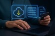 © Ismaile - Person using a laptop with icons for cloud storage and data management hand computer