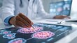 © Justlight - Medium frame showing oncologist pointing to handdrawn tumor features on a pad with softfocused electronic medical records and team notes behind highlighting patientfriendly