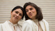 © Erika - Side view young friends two women. Family photo. Hapapy day. Background. Two woman. Emotion.