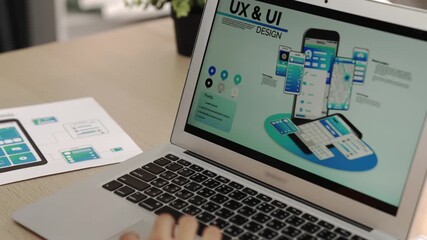 Wall Mural - panorama video of startup ux developer or company employee using laptop design user interface or ui 