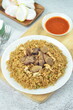 © Afif - Delicious beef fried rice with egg, chilli, crackers and green onion, Indonesian dish.