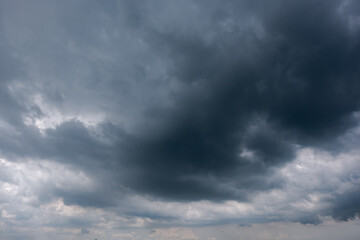 Wall Mural - dark sky with stormy clouds. dramatic sky rain,dark clouds before a thunder-storm,clouds before rain