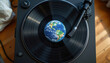 © rada - A vinyl record featuring a globe design, representing music and global unity in a creative artistic setting.