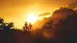 © 艺橙 张 - Family silhouette against a mountain sunset, evoking outdoor adventure and togetherness.
