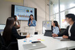 © crizzystudio - Asian businesswoman leading meeting, giving presentation in modern office