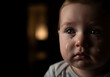 © DesignByNoor - Tearful toddler a close up of a baby s upset face