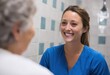 © Fancy Imagination - Smiling nurse in blue scrubs talking with elderly patient indoors