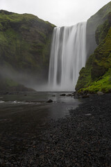 Canvas Print - scenic view of skogafoss waterfall in icelandic summer.
