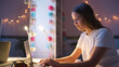 © Monkey Business - Teenage Girl Studying At Home With Laptop In Bedroom Desk At Night