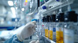 © Coli - Medical technician preparing intravenous fluids.